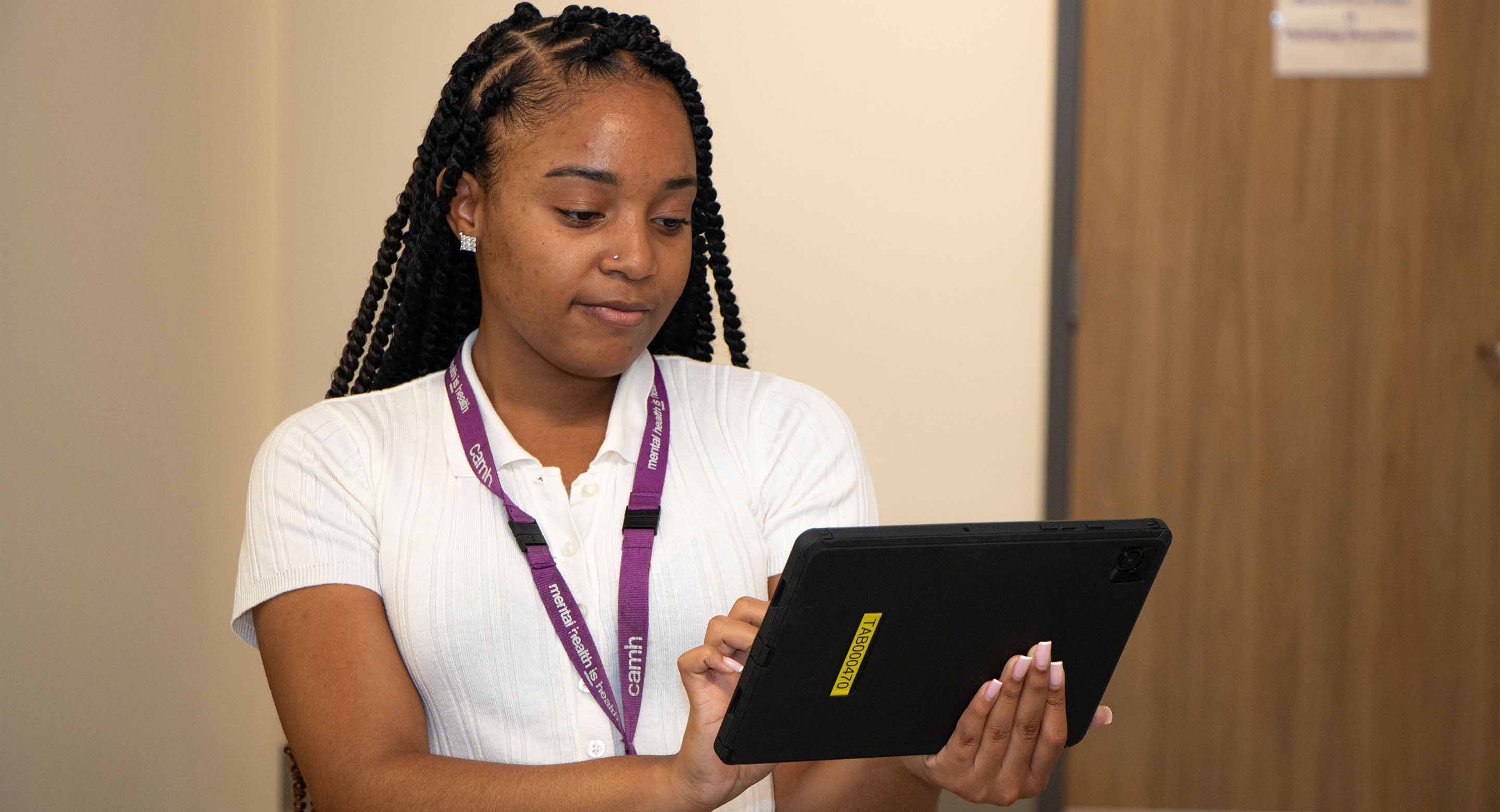 PRT staff member using a tablet