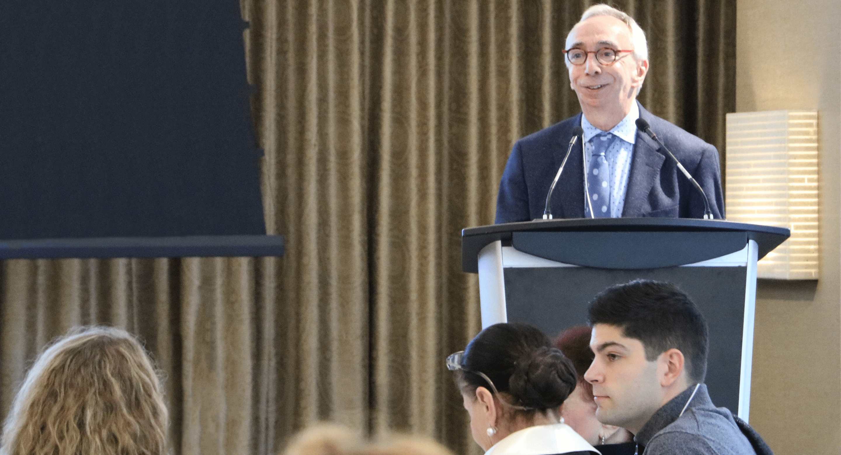 Dr. Ivan Silver addresses an audience