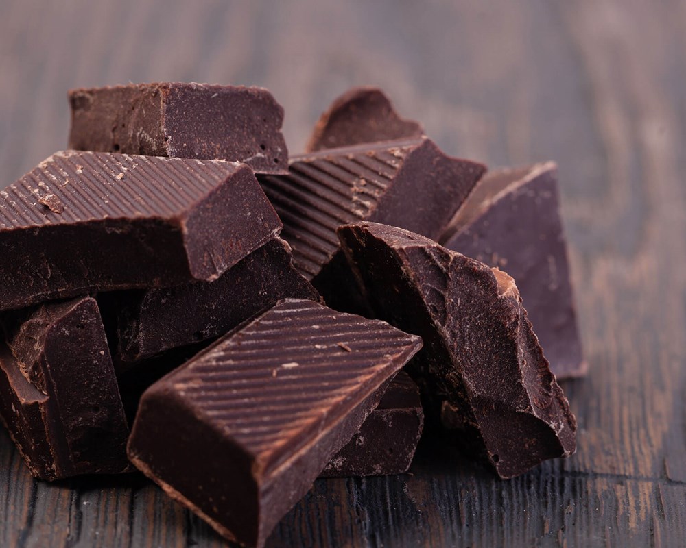 A mouth-watering photo of a pile of bittersweet chocolate.