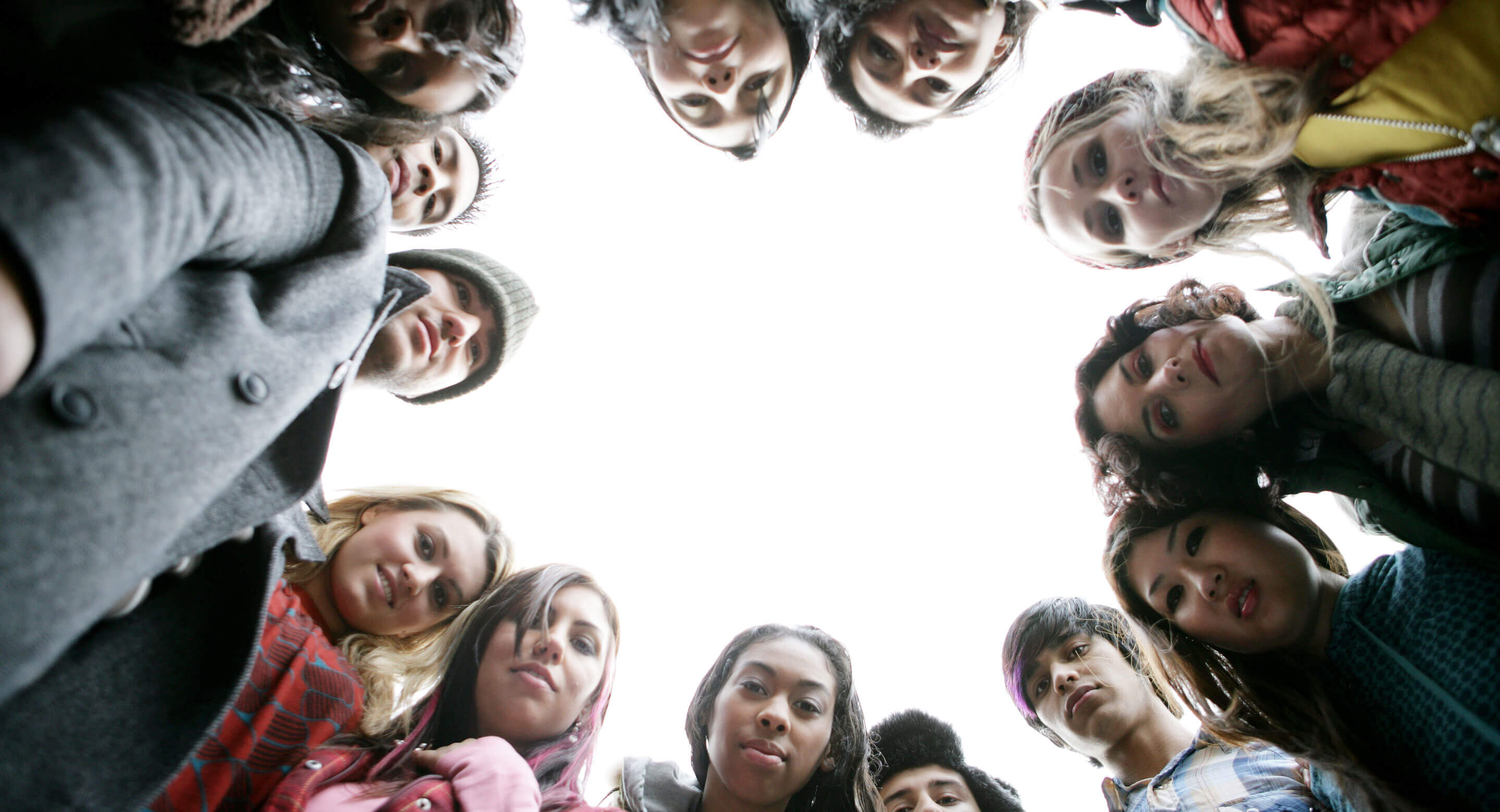 Photo of youth in a circle