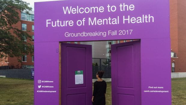 A set of purple doors outside of CAMH with the phrase 