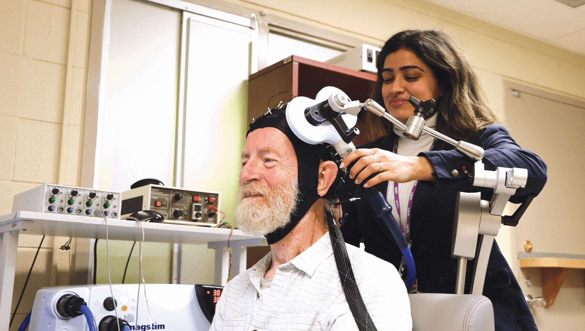 Person receiving brain stimulation.