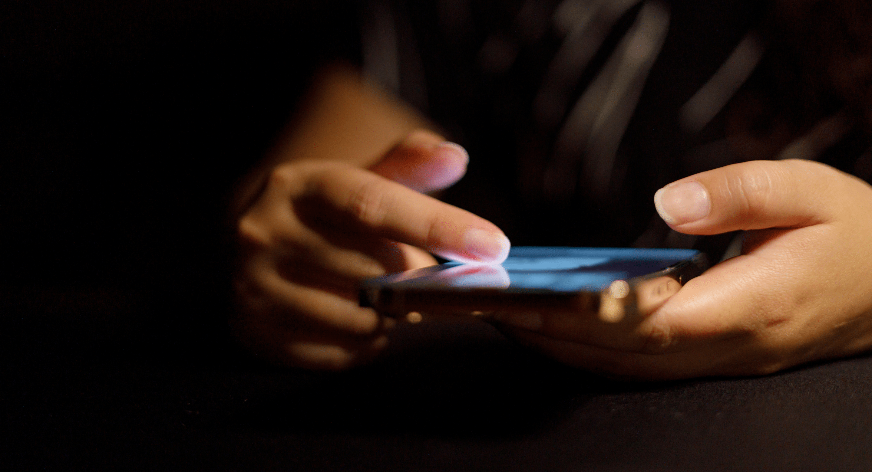 Person scrolling on phone