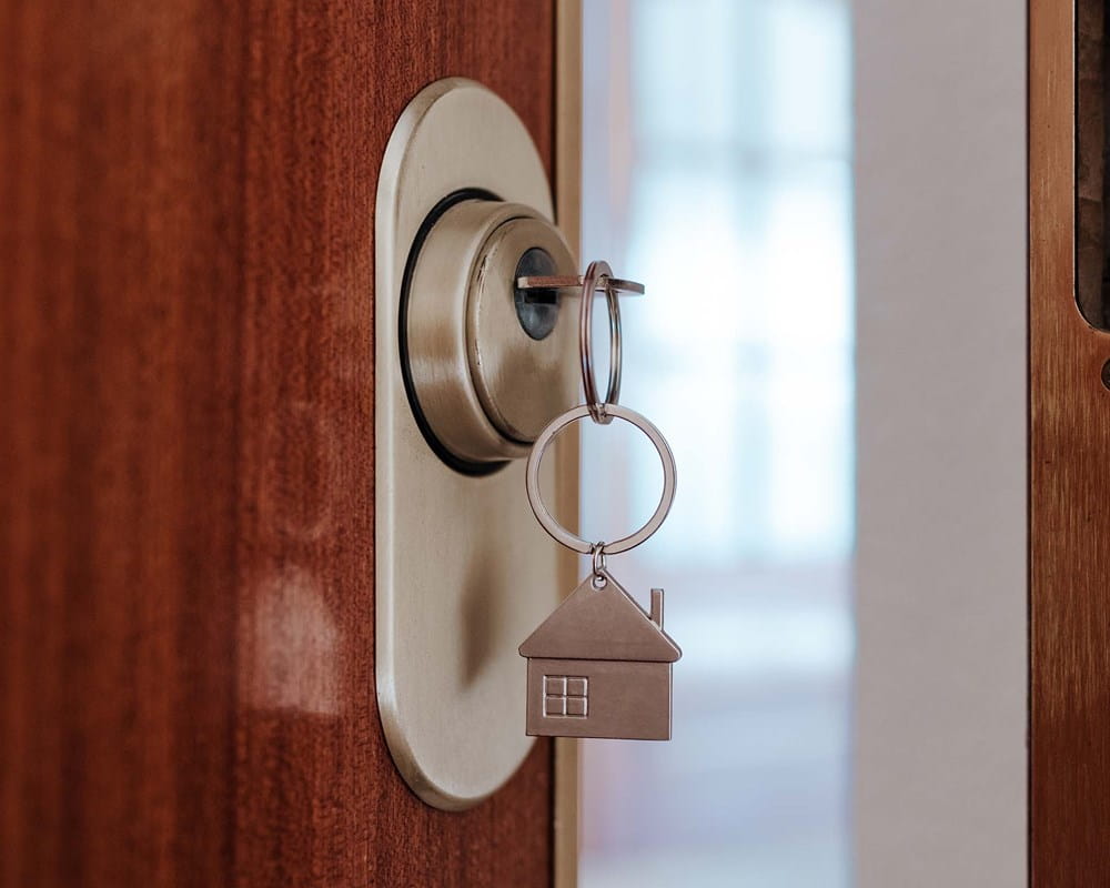 Key in a door that's slightly ajar