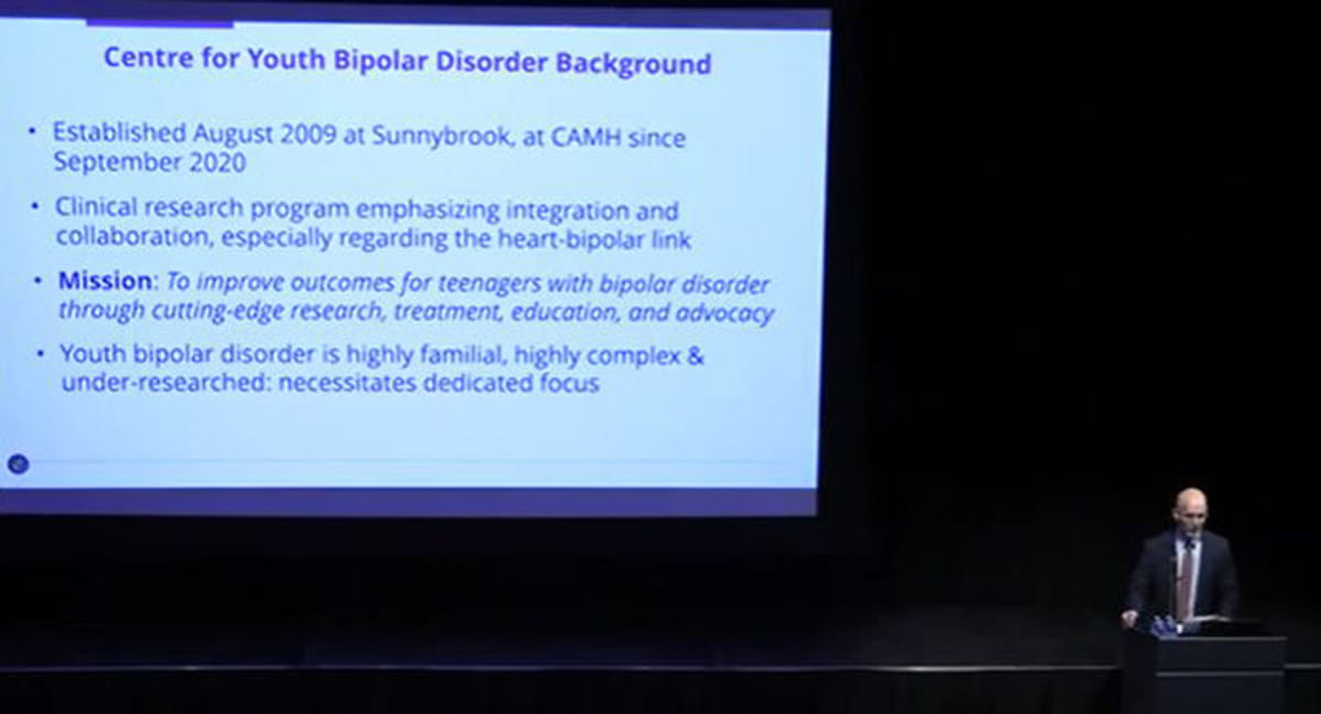 Dr. Goldstein speaking at an event