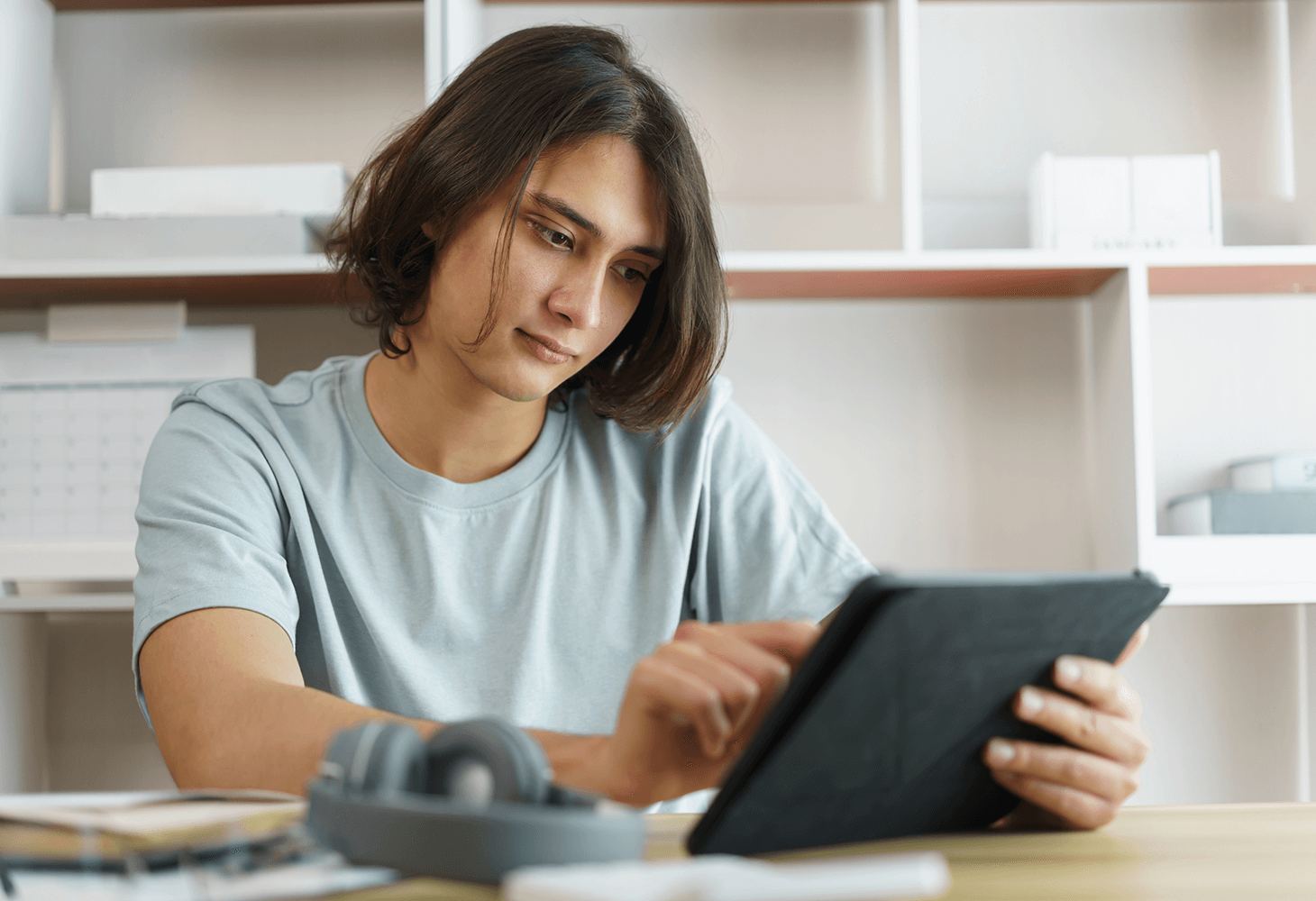 Teen using tablet to fill out questionnaire